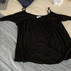 Black open shoulder knit top from Anthropologie